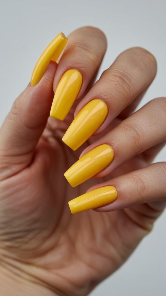 Bright Yellow Nails with Cute Daisies