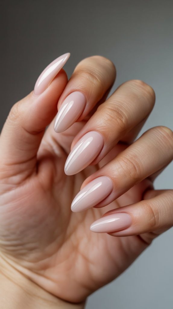 Feminine Flair: Almond-Shaped Nude Nails
