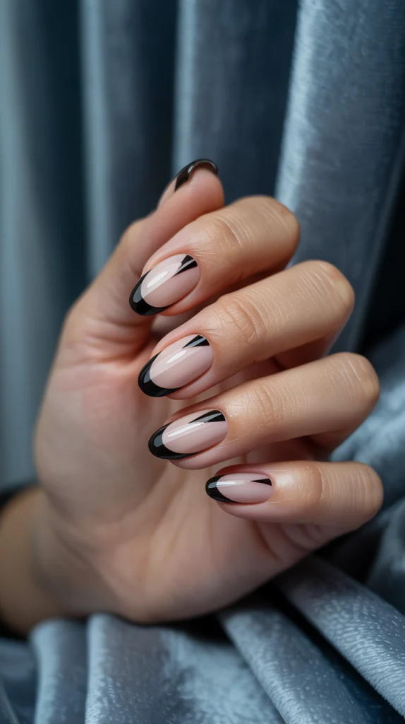 Bold Contrast Nude Almond Nails with Black Designs