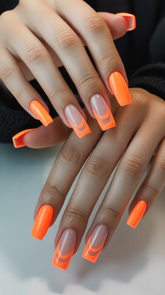 Neon Orange Nails with Negative Space Designs